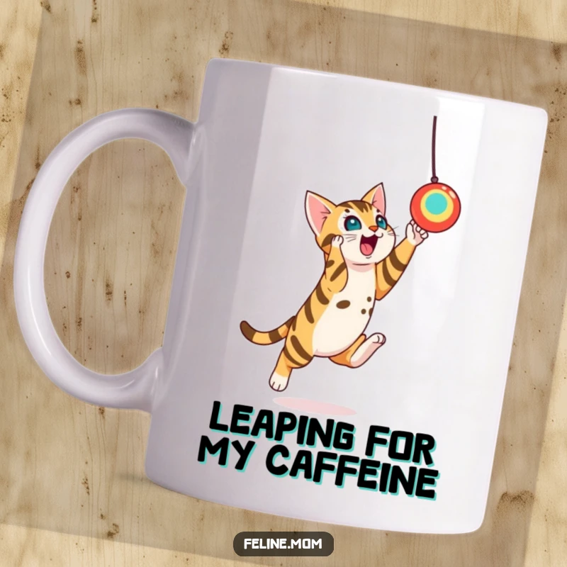 Funny Bengal Cat Toy Leap Mug: A playful Bengal cat leaps dynamically towards a dangling toy, capturing the thrill of the hunt.