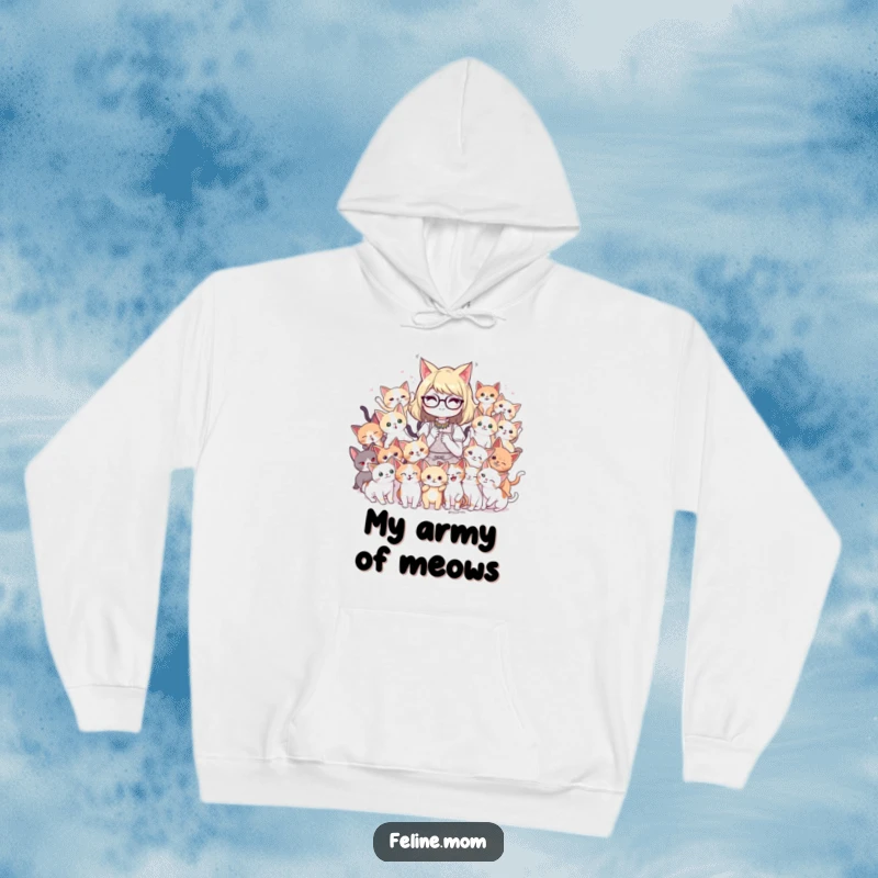 Funny cat lady character looking cozy while surrounded by a playful mob of cute kittens on a warm and humorous hoodie.