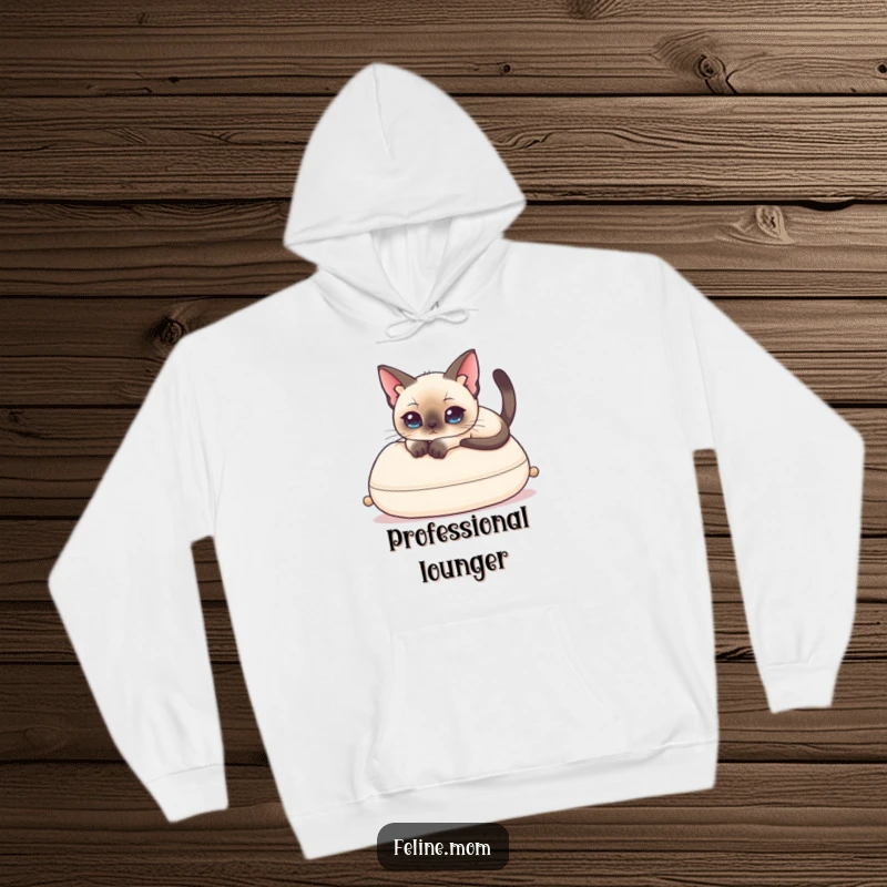 Funny Siamese Cat Hoodie showing a stylish cat elegantly resting on a plush cushion, conveying a humorous, relaxed vibe.