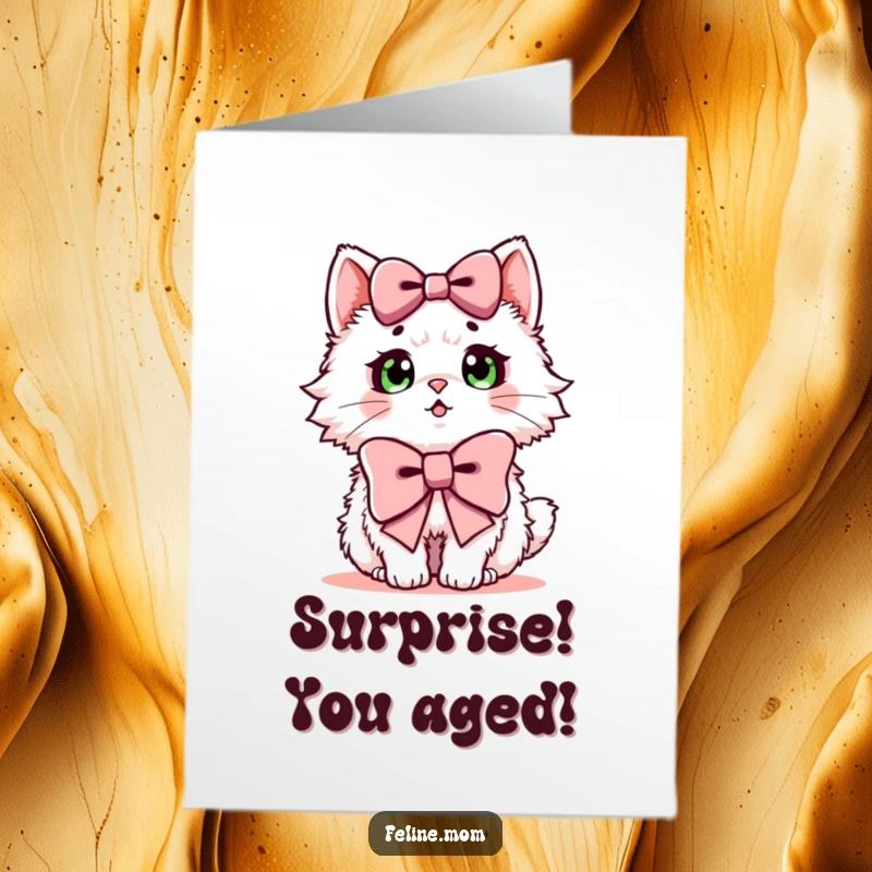 Funny Free Printable Birthday Card: A fluffy cat startled by a giant bow, looking wide-eyed with surprise.