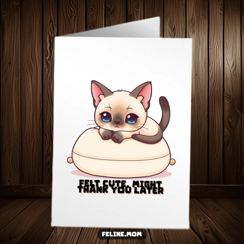 Funny Free Printable thank you card featuring a regal Siamese cat lounging on a cushion, offering a humorous and elegant expression of thanks.