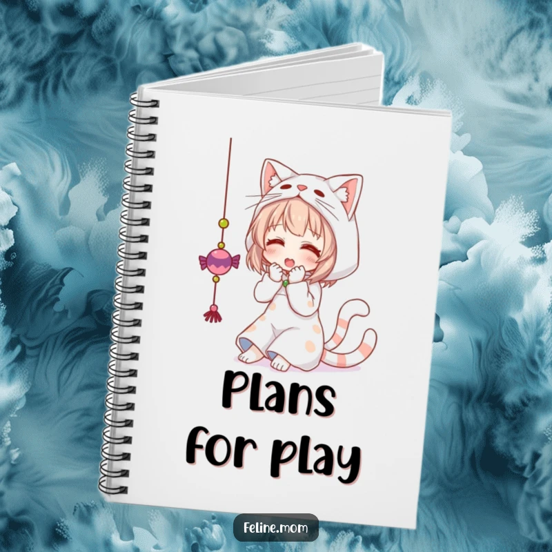 Funny notebook cover with a woman dressed as a cat, playfully batting at a hanging toy. A humorous stationery item.