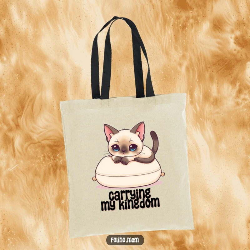 Funny Siamese Cat Tote Bag showcasing an elegant cat draped over a cushion, offering a humorous and chic way to carry items.