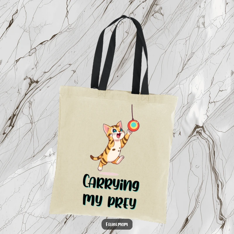 Funny Bengal Cat Toy Leap Tote Bag: A playful Bengal cat leaps towards a dangling toy, perfect for carrying your supplies.